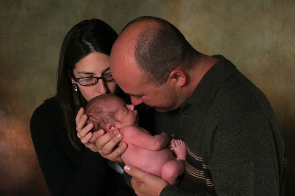 Parents Holding Baby