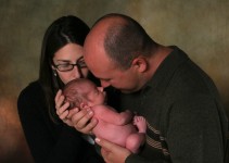 Parents Holding Baby