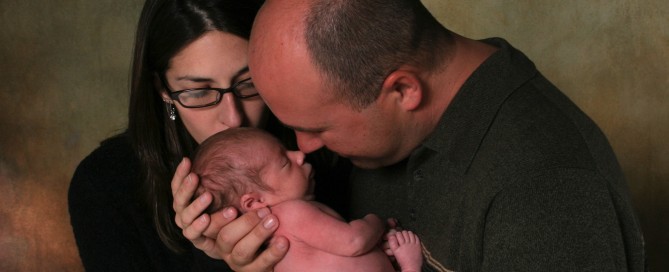 Parents Holding Baby